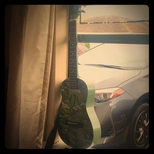 Toy guitar Almost new